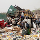 Scavengers work picking up trash for recycling at the a dump site in Lagos